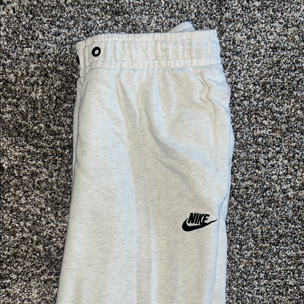 Nike white sweat pants.